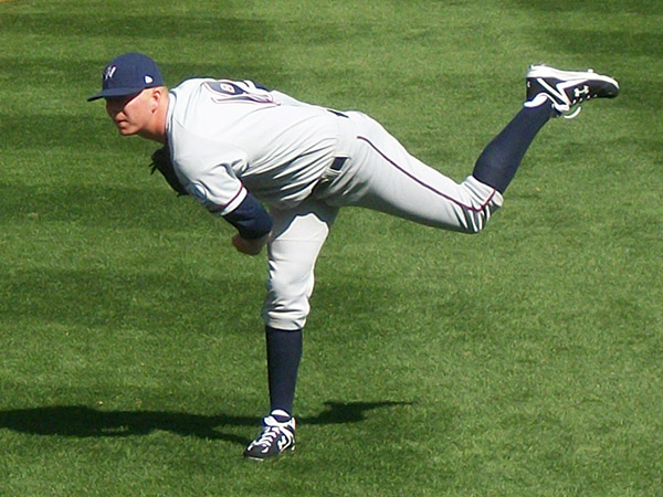 John Lamb warms up in the outfield before the Royals futures game.